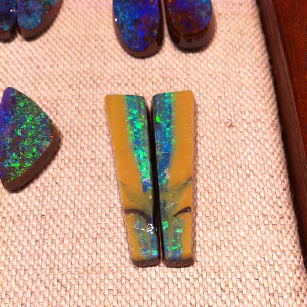 10+ Way Cool Cabochons from Around the World Seen in Tucson. boulder opal cabs is from Koroit in Queensland by Gene McDevitt