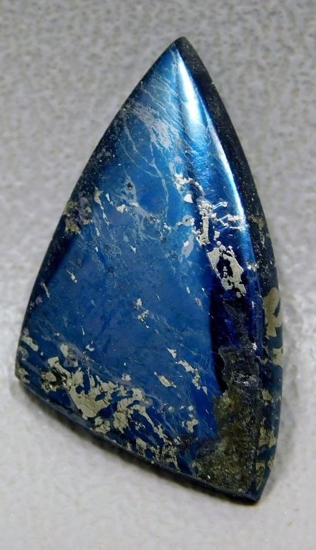 gemstones: This is covellite, a very soft copper sulfide with a gun-metal/indigo blue color. What a conversation starter! Photo courtesy Barlow’s Gems.