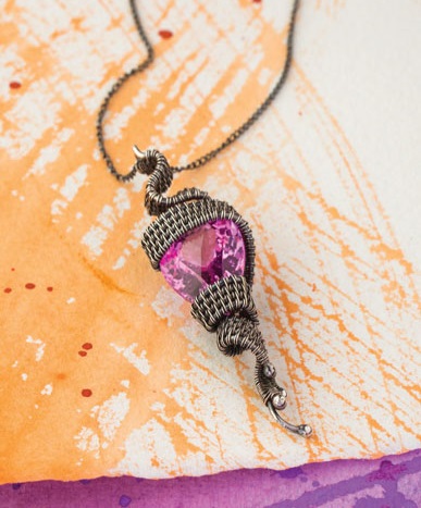 Coil the base on this wire weaving pendant by Sarah Thompson