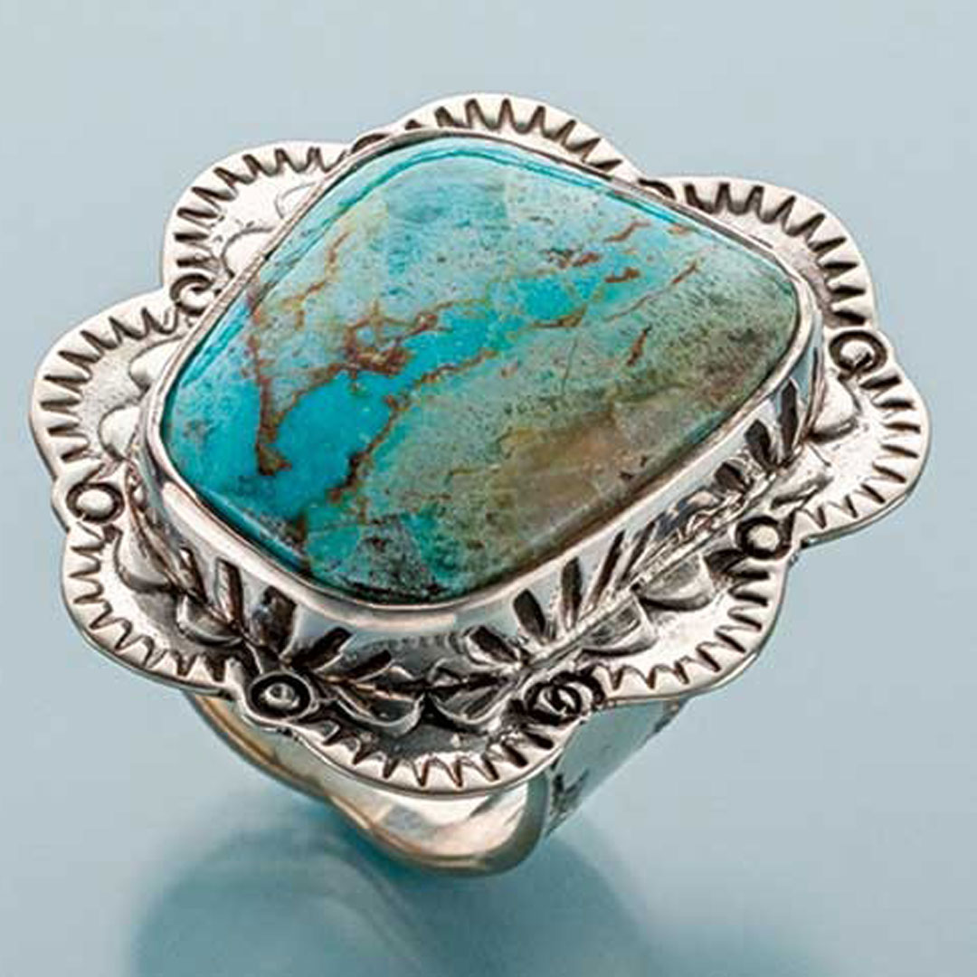 stamped metal jewelry: Jeff Fulkerson Stamped Bezel Ring Sterling silver, turquoise PHOTO: JIM LAWSON