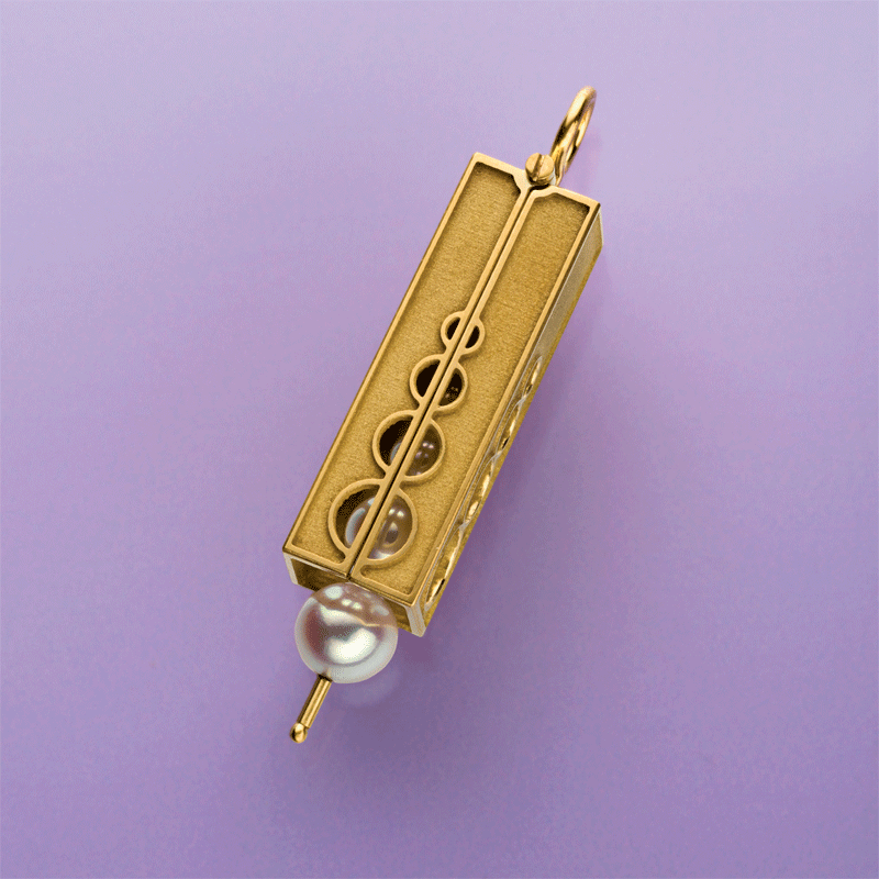 Watch Grant Robinson’s Pearl Chime Kinetic Pendant in Motion Watch Grant Robinson’s Pearl Chime Kinetic Pendant in Motion