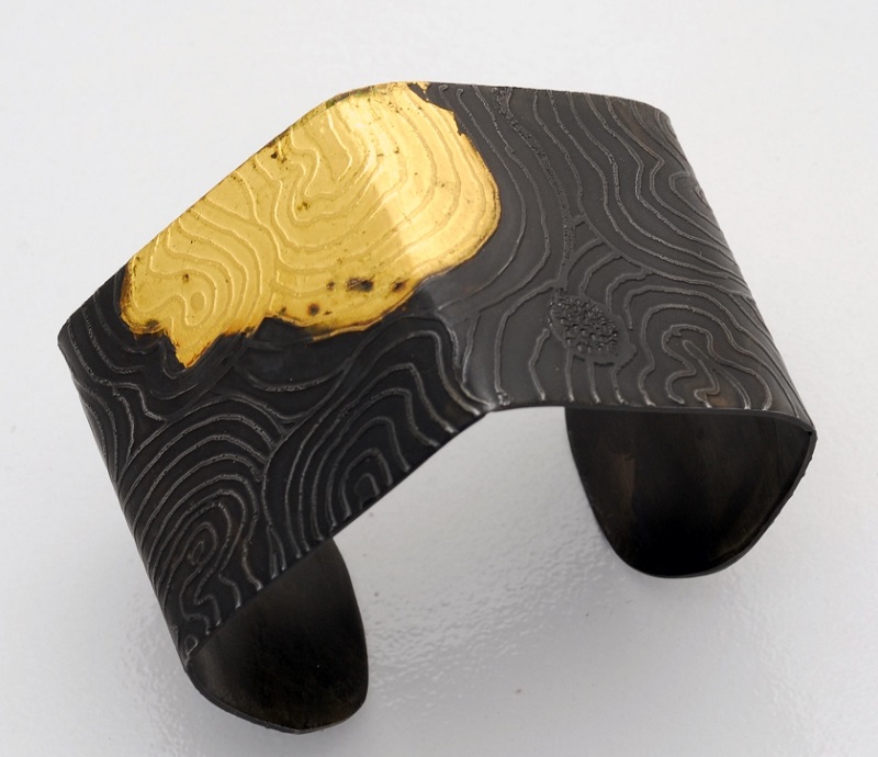 gold fused onto steel jewelry by jewelry artist Bette Barnett