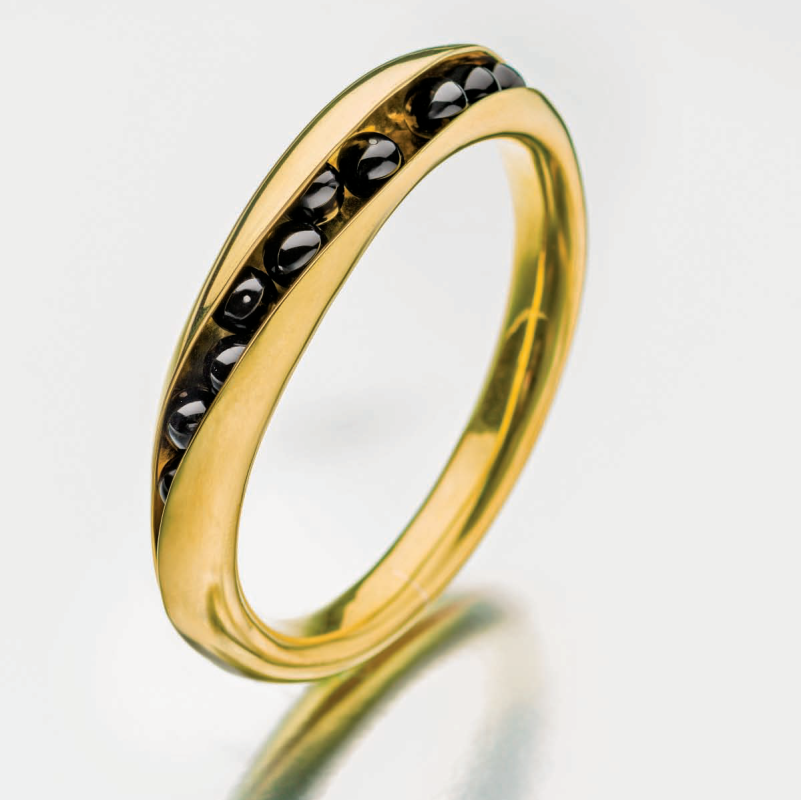 bracelets: Bill Fretz 3D brass bangle with onyx beads