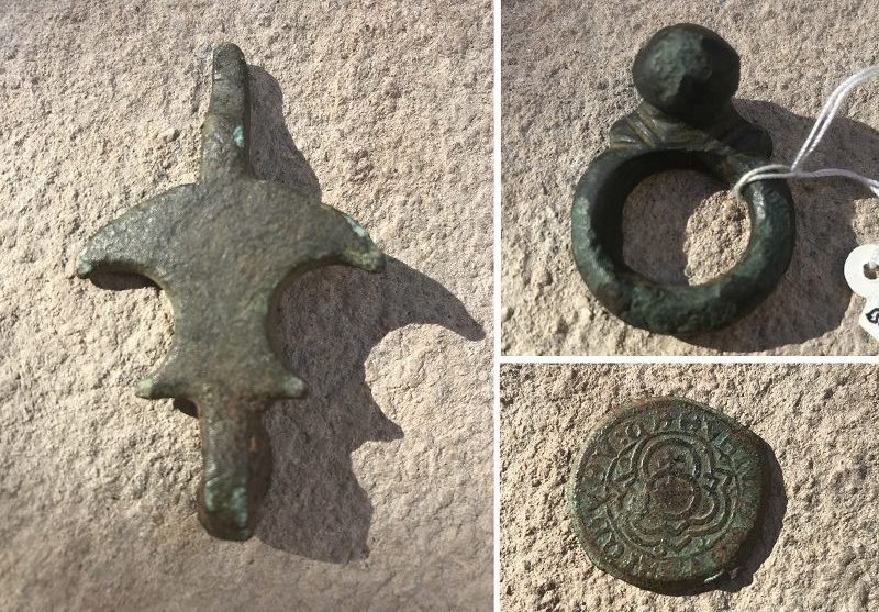 hinge, coin,and horse tack artifacts with natural green patina on copper and brass