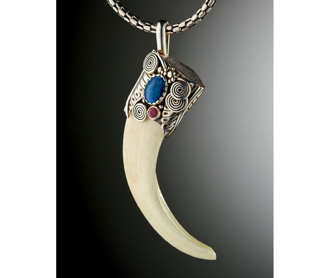 This Boar Tusk Pendant by Roger Halas was originally published in Lapidary Journal Jewelry Artist, August 2012; photo: Jim Lawson