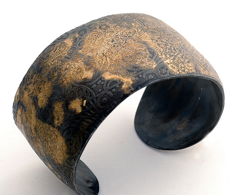 gold fused onto steel jewelry by jewelry artist Bette Barnett