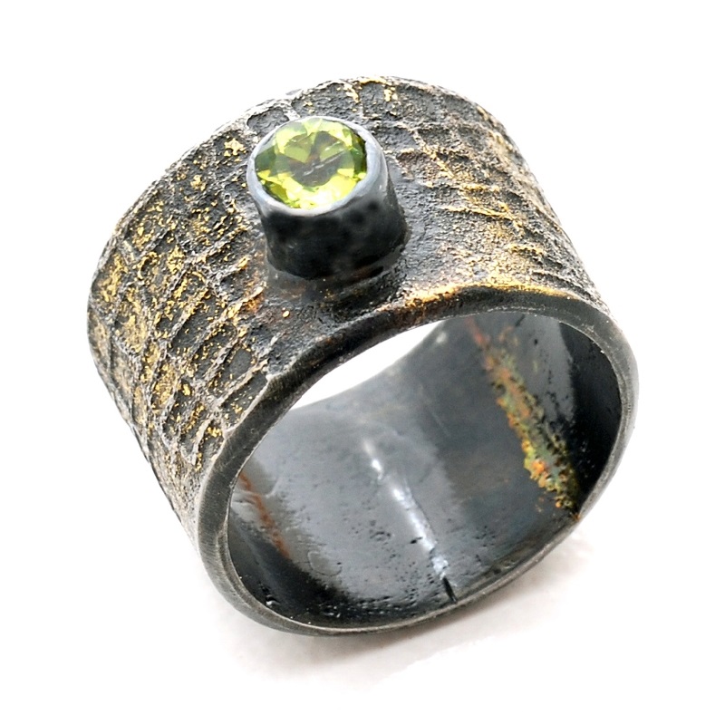 gold fused onto steel jewelry by jewelry artist Bette Barnett