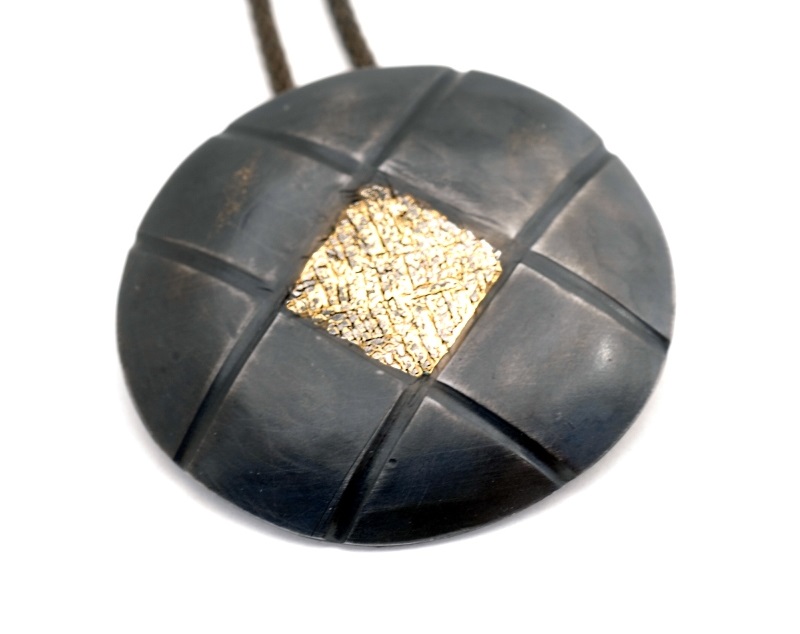 gold fused onto steel jewelry by jewelry artist Bette Barnett