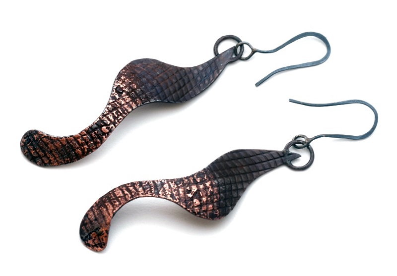 gold fused onto steel jewelry by jewelry artist Bette Barnett