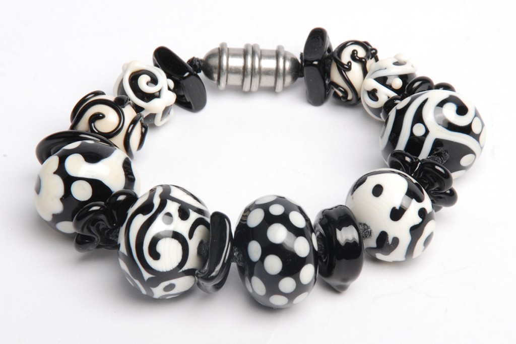 "For the Love of Black & White," by Tammy Honaman, 2016, waxed linen, pewter, silver-plated clasp, lampworked glass beads