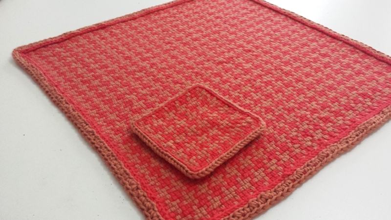 Small looms like a frame loom or pin loom can be used to make fun, attractive projects, like this woven placemat and coaster.